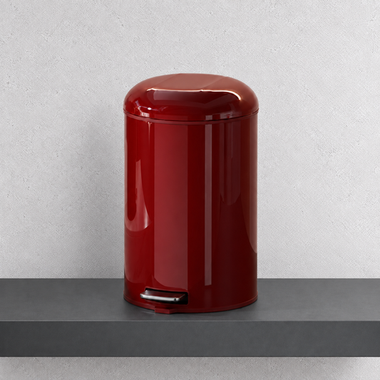 Poubelle à pédale LYAKE rouge bordeaux, vue de face sur une tablette béton
