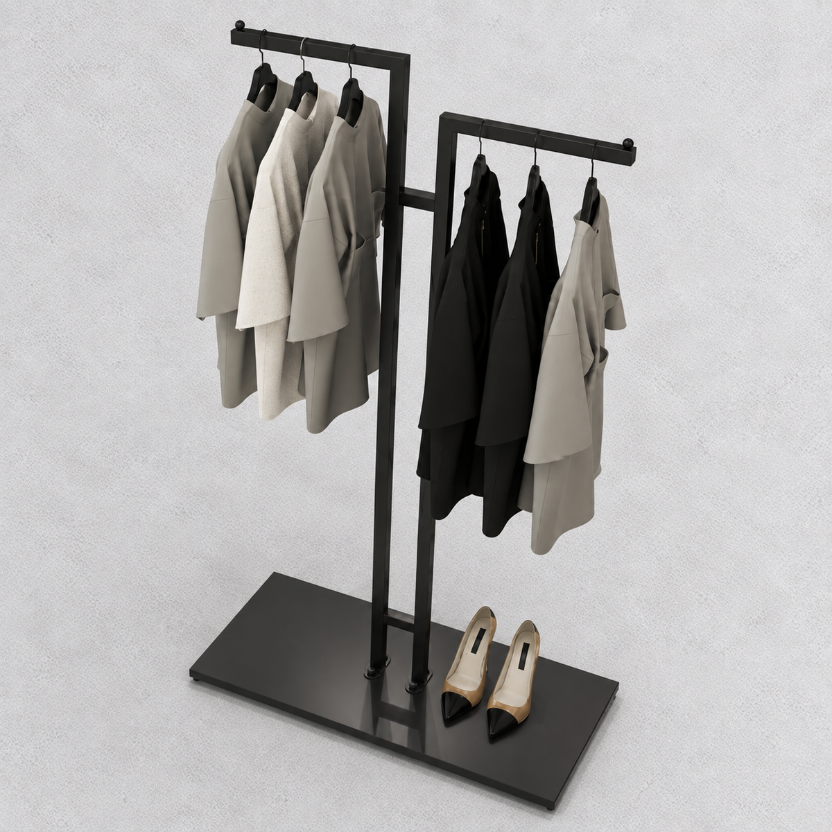 Le portant de trois quarts, chemises et vestes suspendues, chaussures posées sur le socle
